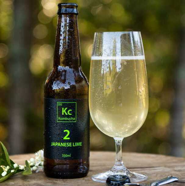 Kc Kombucha Japanese Lime bottle and glass